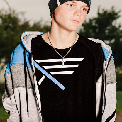 Christian teen wearing a cross and Christian Apparel with zip-up hoodie, beanie, and bamboo tee.