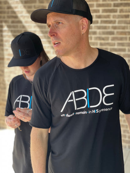 Steve Cohen Now Found Apparel Co-Founder and Shelby Cohen wearing Now Found Christian Apparel ABIDE Bamboo Tees and ABIDE Black Trucker hats