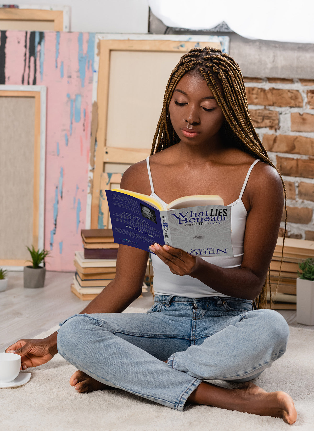 christian african american woman reading "what lies beneath" by steven cohen and now found publishing